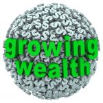 the words growing wealth on a ball made of dollar signs or currency to illustrate accumulating riches through income, investment or other ways of earning money